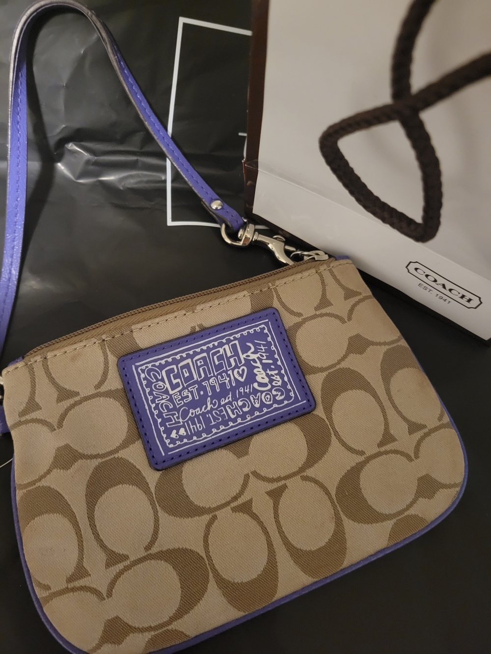 Coach Tan Signature Canvas Wristlet with Purple Trim